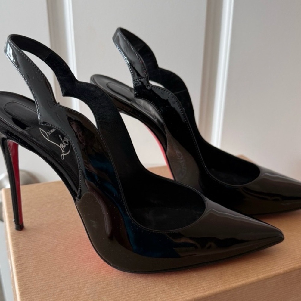 Christian Louboutin hot chick 100 
Black Patent Slingback Pumps with Red Soles